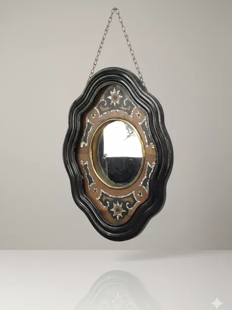 Spiegel met Kloklijst 19de eeuw Napoleon III Franse spiegel met inleg van parelmoer en ebbenhout.